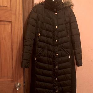 Brand name jacket, long overcoat black with buttons and zipper.